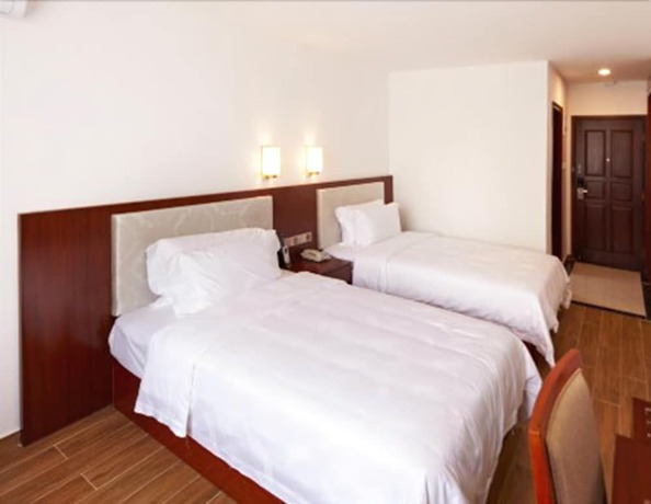 Imagen de la habitación del Hotel Zhu Yuan. Foto 10