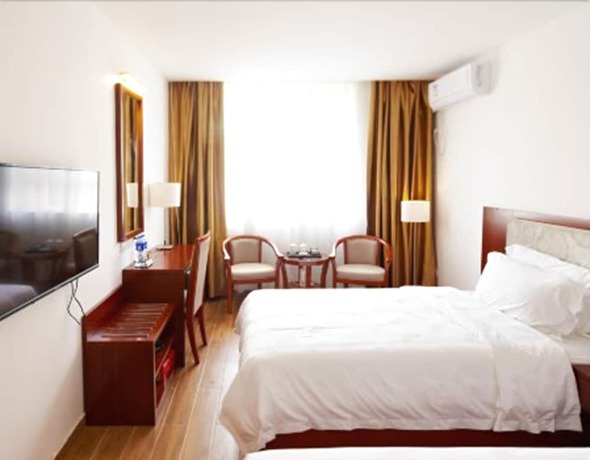 Imagen de la habitación del Hotel Zhu Yuan. Foto 11