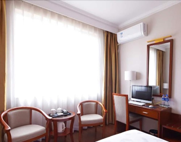 Imagen de la habitación del Hotel Zhu Yuan. Foto 13