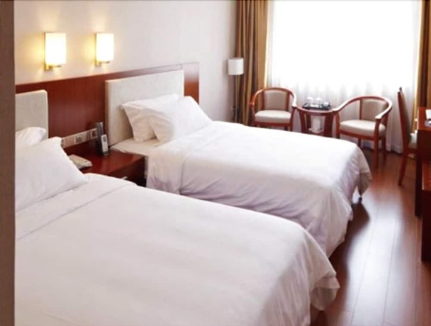 Imagen de la habitación del Hotel Zhu Yuan. Foto 15