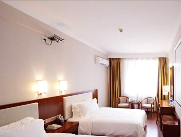 Imagen de la habitación del Hotel Zhu Yuan. Foto 17