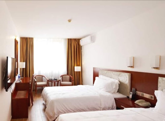 Imagen de la habitación del Hotel Zhu Yuan. Foto 18