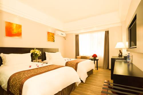 Imagen de la habitación del Hotel Zhuhai Aqueen. Foto 6