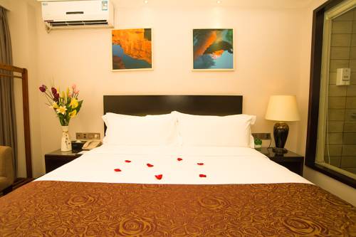Imagen de la habitación del Hotel Zhuhai Aqueen. Foto 9