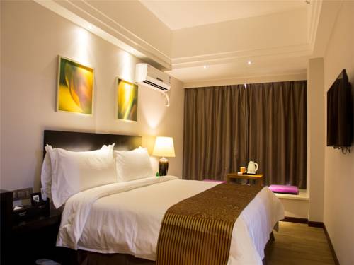 Imagen de la habitación del Hotel Zhuhai Aqueen. Foto 10