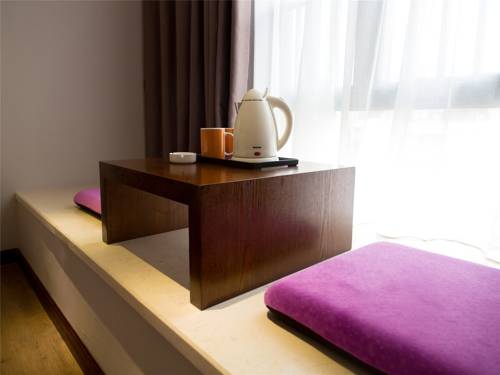 Imagen de la habitación del Hotel Zhuhai Aqueen. Foto 11