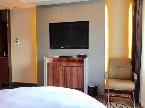 Imagen de la habitación del Hotel Zhuhai Asian Star. Foto 2