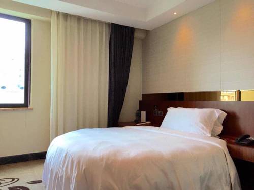 Imagen de la habitación del Hotel Zhuhai Asian Star. Foto 4