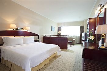 Imagen de la habitación del Hotel Zhuhai Catic. Foto 5