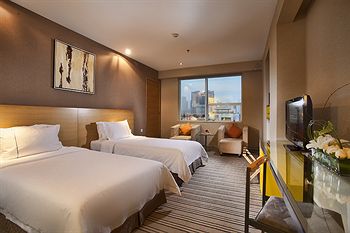 Imagen de la habitación del Hotel Zhuhai Catic. Foto 6