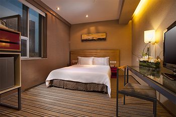 Imagen de la habitación del Hotel Zhuhai Catic. Foto 7