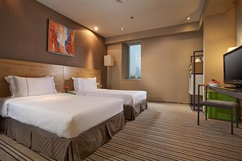 Imagen de la habitación del Hotel Zhuhai Catic. Foto 9
