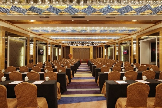 Imagen de los interiores del Hotel Zhuhai Charming Holiday. Foto 11