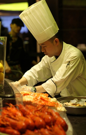 Imagen del bar/restaurante del Hotel Zhuhai Charming Holiday. Foto 3
