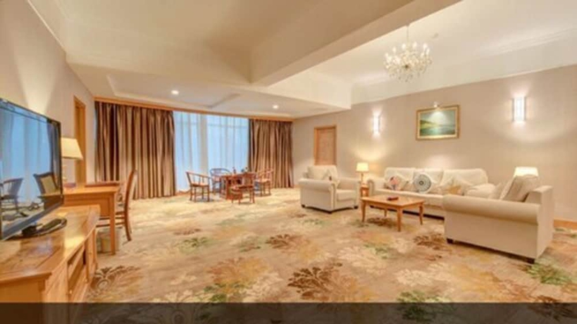 Imagen de la habitación del Hotel Zhuhai Dehan. Foto 2