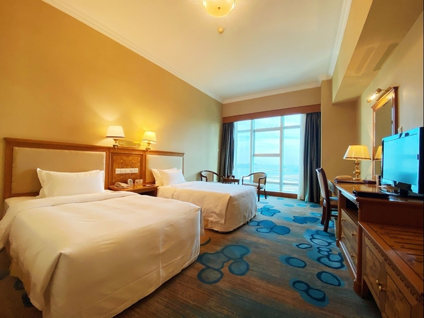 Imagen de la habitación del Hotel Zhuhai Dehan. Foto 4