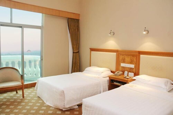 Imagen de la habitación del Hotel Zhuhai Dehan. Foto 5