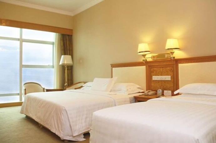 Imagen de la habitación del Hotel Zhuhai Dehan. Foto 8