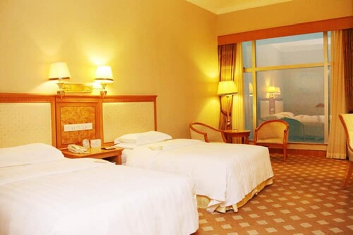 Imagen de la habitación del Hotel Zhuhai Dehan. Foto 9