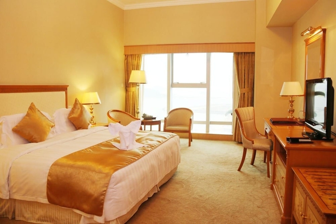 Imagen de la habitación del Hotel Zhuhai Dehan. Foto 12