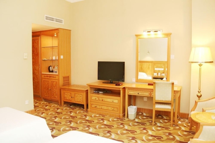Imagen de la habitación del Hotel Zhuhai Dehan. Foto 14