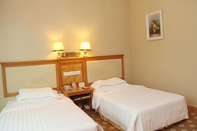 Imagen de la habitación del Hotel Zhuhai Dehan. Foto 16