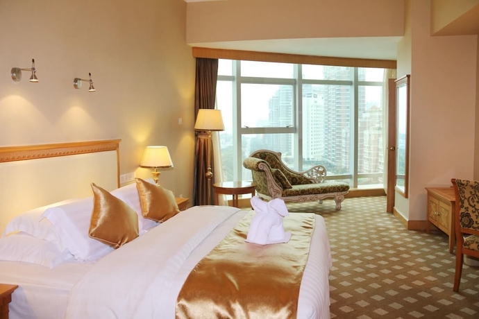 Imagen de la habitación del Hotel Zhuhai Dehan. Foto 17