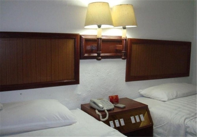 Imagen de la habitación del Hotel Zhuhai Gong Bei Palace. Foto 5