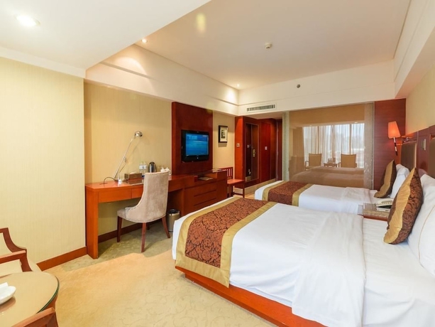 Imagen de la habitación del Hotel Zhuhai Guotai. Foto 6