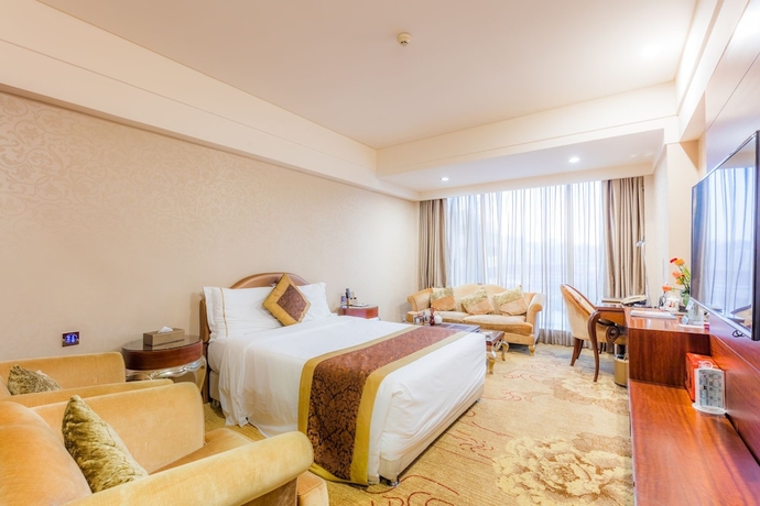 Imagen de la habitación del Hotel Zhuhai Guotai. Foto 9