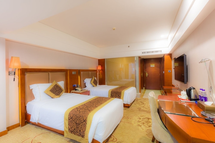 Imagen de la habitación del Hotel Zhuhai Guotai. Foto 10