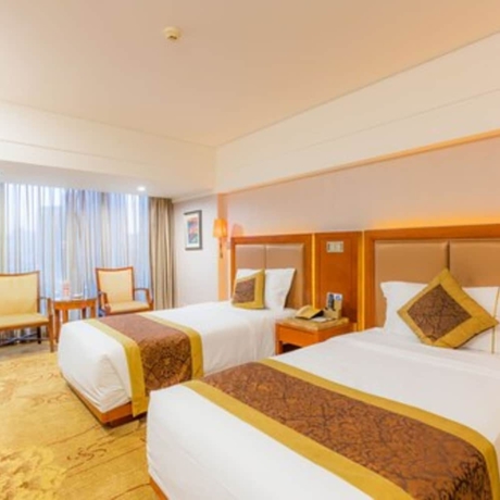 Imagen de la habitación del Hotel Zhuhai Guotai. Foto 12