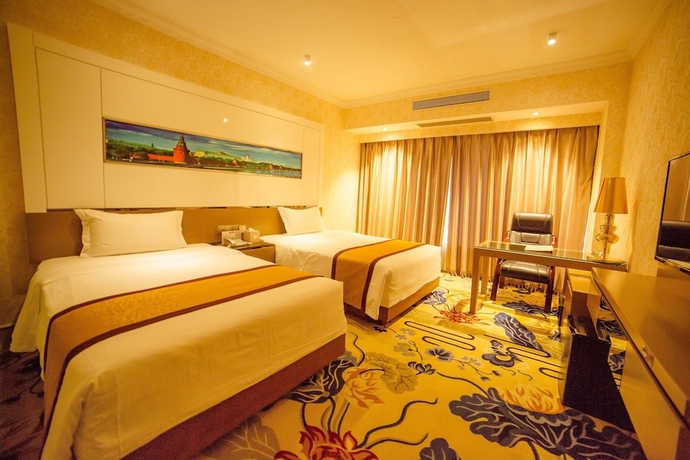 Imagen de la habitación del Hotel Zhuhai Guozheng. Foto 4