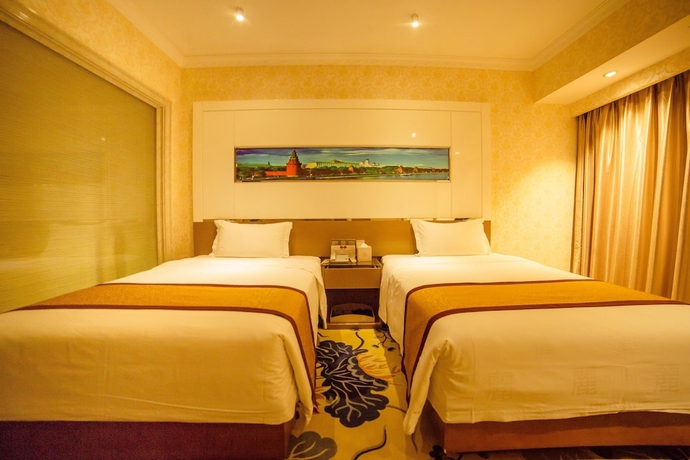Imagen de la habitación del Hotel Zhuhai Guozheng. Foto 10