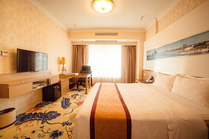 Imagen de la habitación del Hotel Zhuhai Guozheng. Foto 12