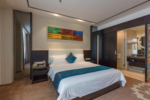 Imagen de la habitación del Hotel Zhuhai Huayu Minfu. Foto 9