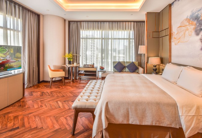 Imagen de la habitación del Hotel Zhuhai Longzhuda International. Foto 4