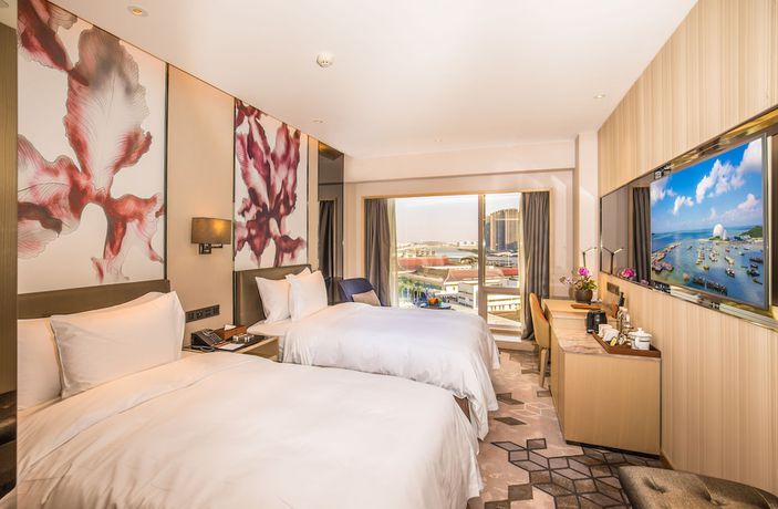 Imagen de la habitación del Hotel Zhuhai Longzhuda International. Foto 9