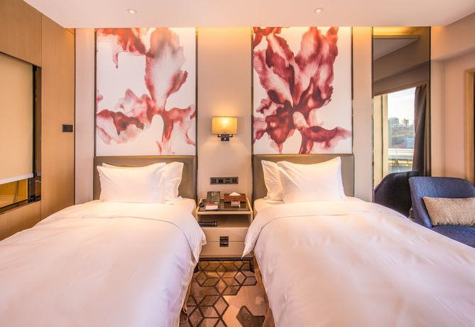 Imagen de la habitación del Hotel Zhuhai Longzhuda International. Foto 15