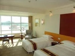 Imagen de la habitación del Hotel Zhuhai MaiHao. Foto 2
