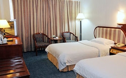 Imagen de la habitación del Hotel Zhuhai Overseas Chinese. Foto 3