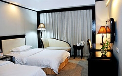 Imagen de la habitación del Hotel Zhuhai Overseas Chinese. Foto 4