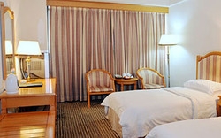 Imagen de la habitación del Hotel Zhuhai Overseas Chinese. Foto 5