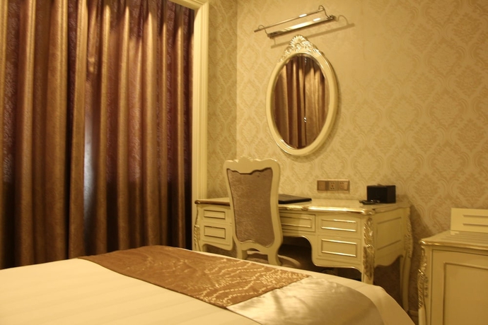 Imagen de la habitación del Hotel Zhuhai Rongfeng. Foto 2