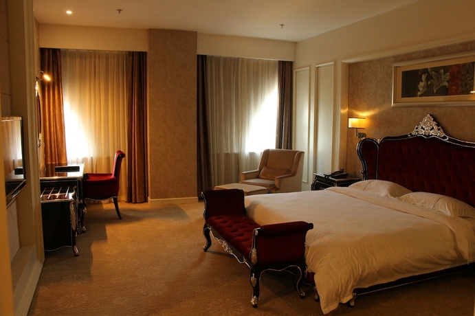 Imagen de la habitación del Hotel Zhuhai Rongfeng. Foto 17
