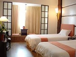 Imagen de la habitación del Hotel Zhuhai Special Economic Zone Hotel. Foto 3