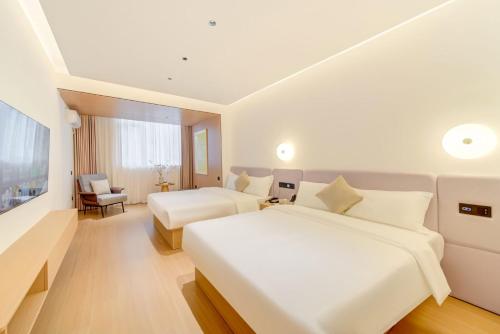 Imagen de la habitación del Hotel Zhuhai Xiangwang. Foto 15
