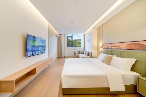 Imagen de la habitación del Hotel Zhuhai Xiangwang. Foto 16