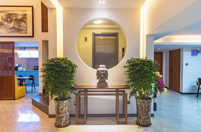 Imagen de los interiores del Hotel Zhuhai Yujia Boutique Homestay. Foto 15