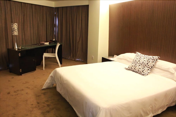 Imagen de la habitación del Hotel Zhuhai Zobon Art. Foto 10